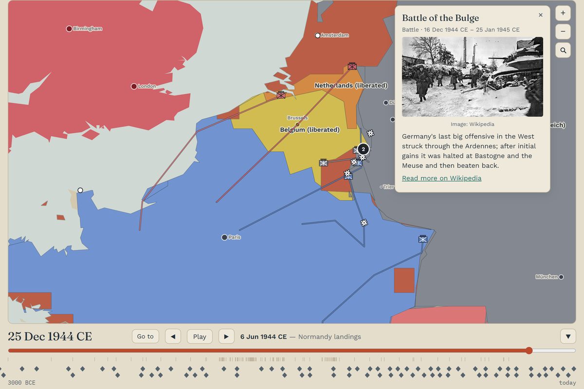World History at 25 December 1944: Belgium and the Ardennes with armies and fronts, the Battle of the Bulge selected, and the timeline with its event density strip below